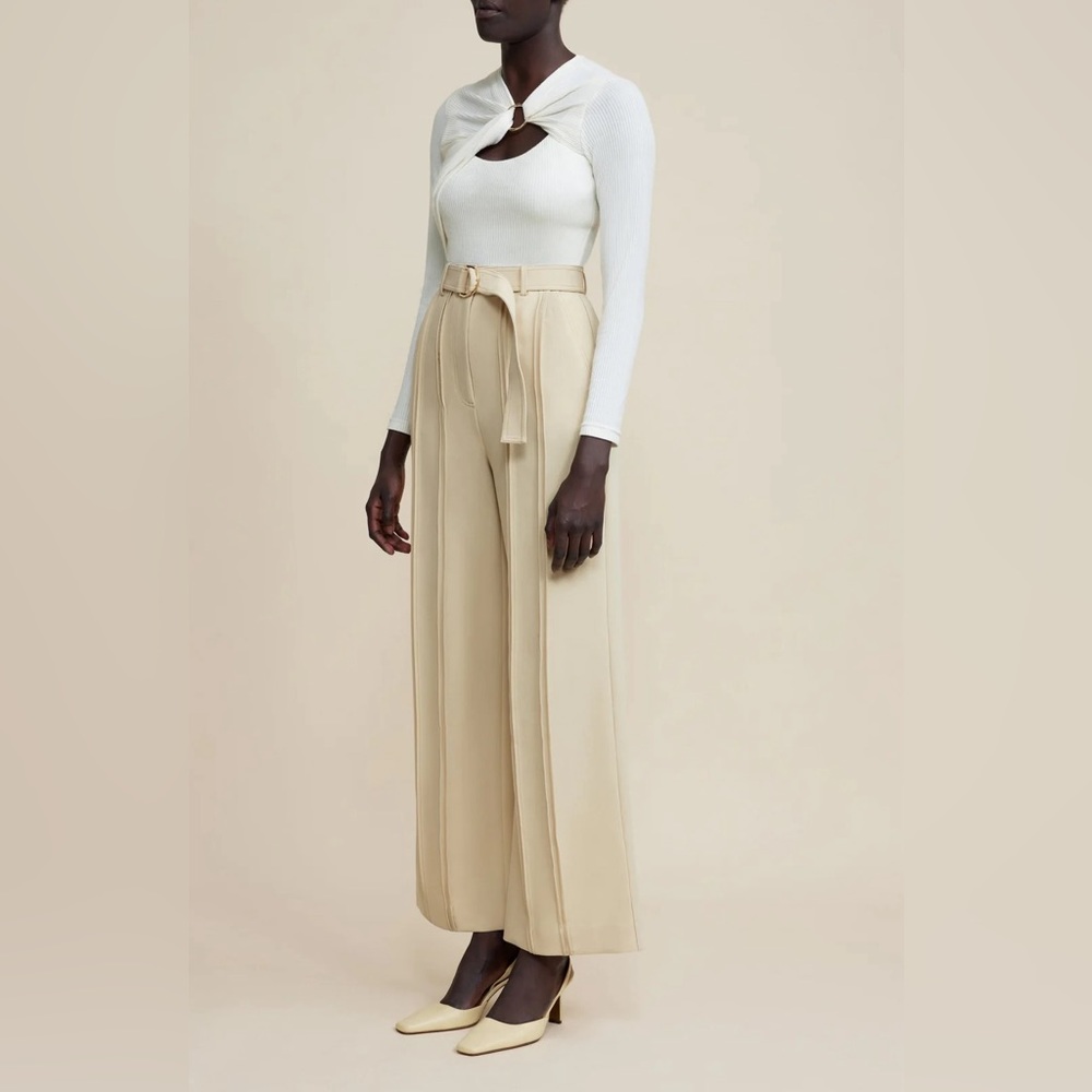- Full length pant
- High waist fit
- Front fly closure
- Removable waist belt
